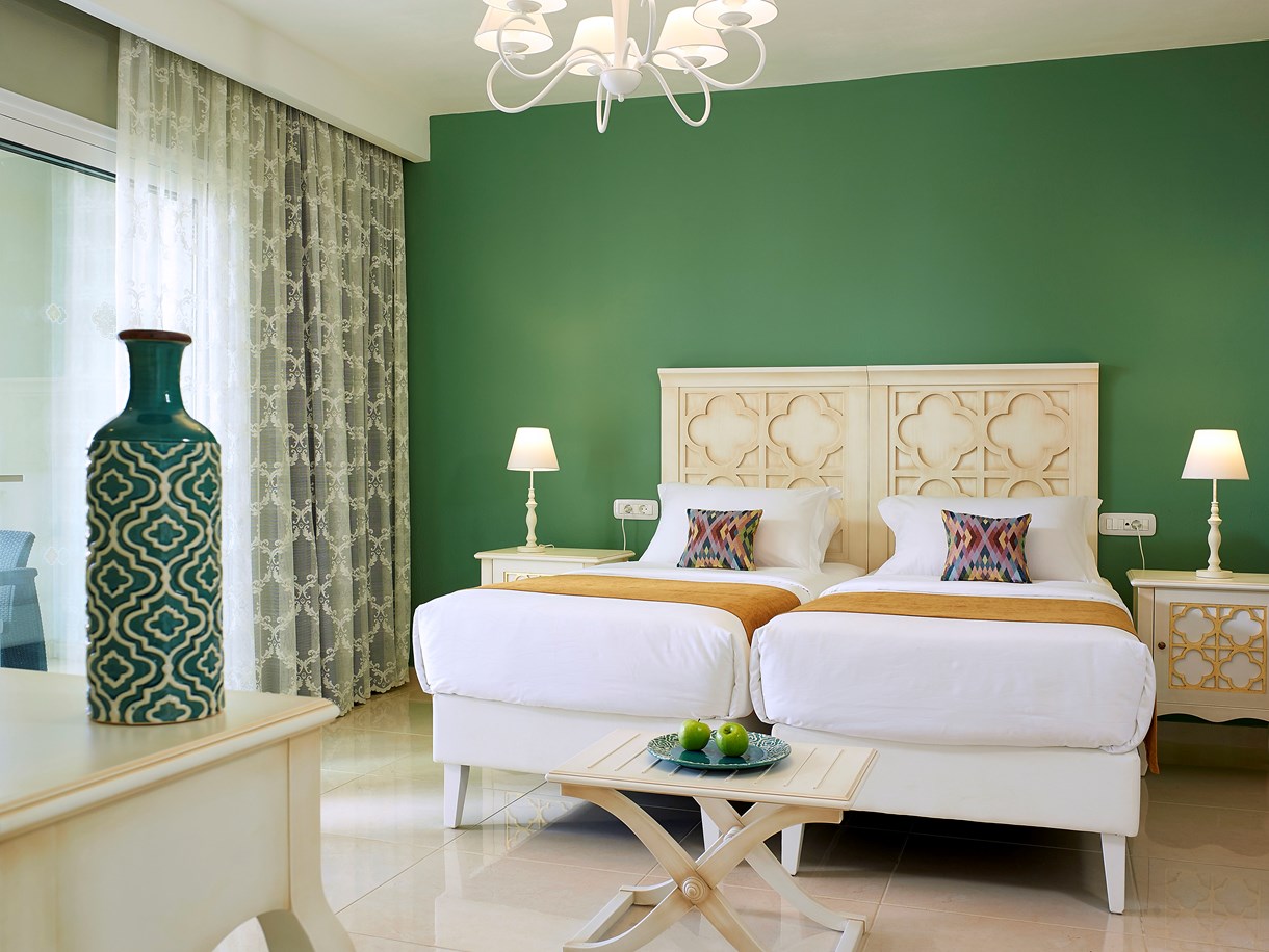 anemosresort_deluxe_2bedroom_familyroom_7.jpg